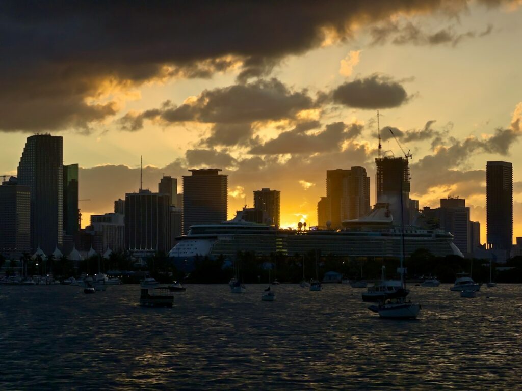 Coastal port sunset illustrating massage planning before or after a Port Canaveral cruise